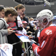 Signing autographs for children.